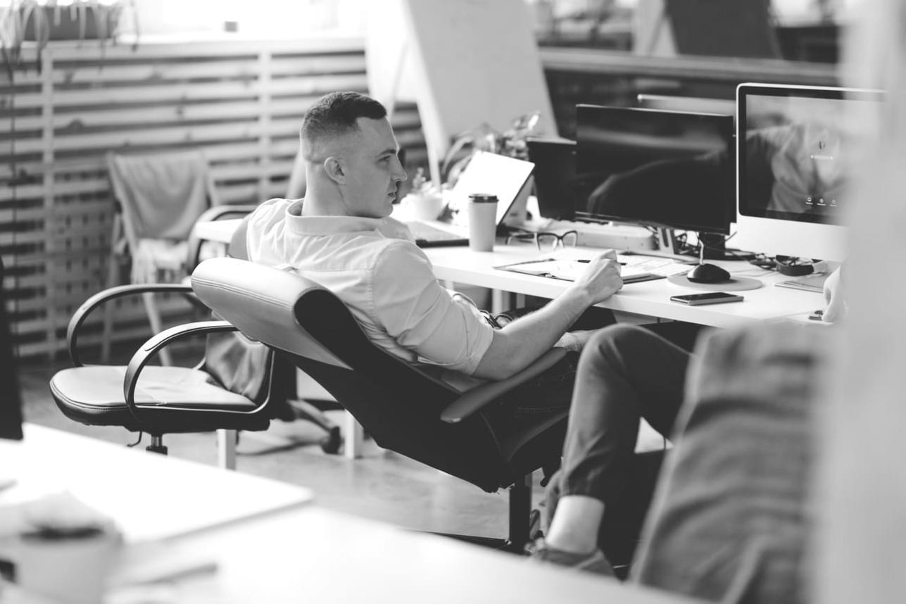 Financial planning workspace with budget analysis documents and strategic planning materials