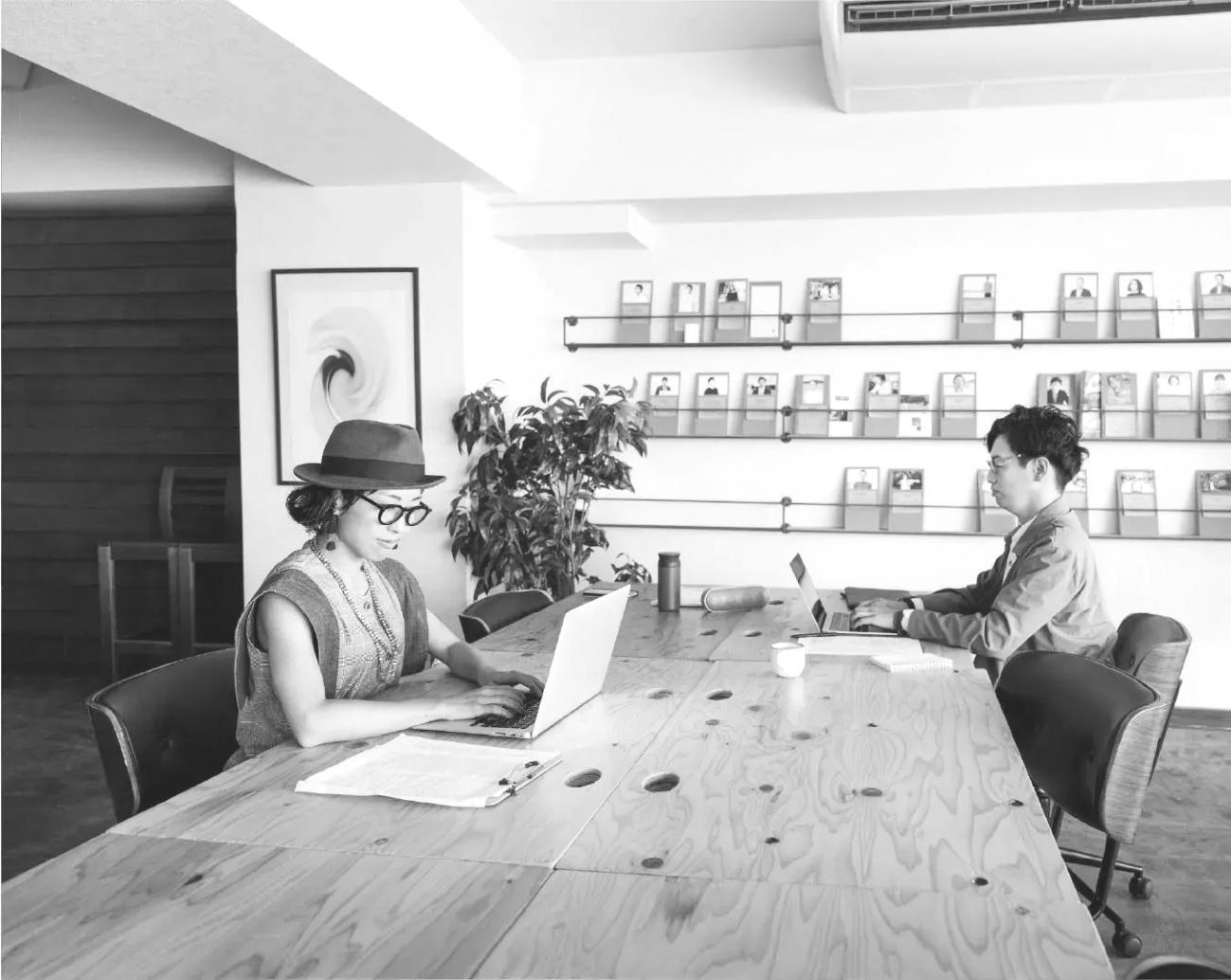 Financial planning consultation session with budget analysis documents and strategic planning materials