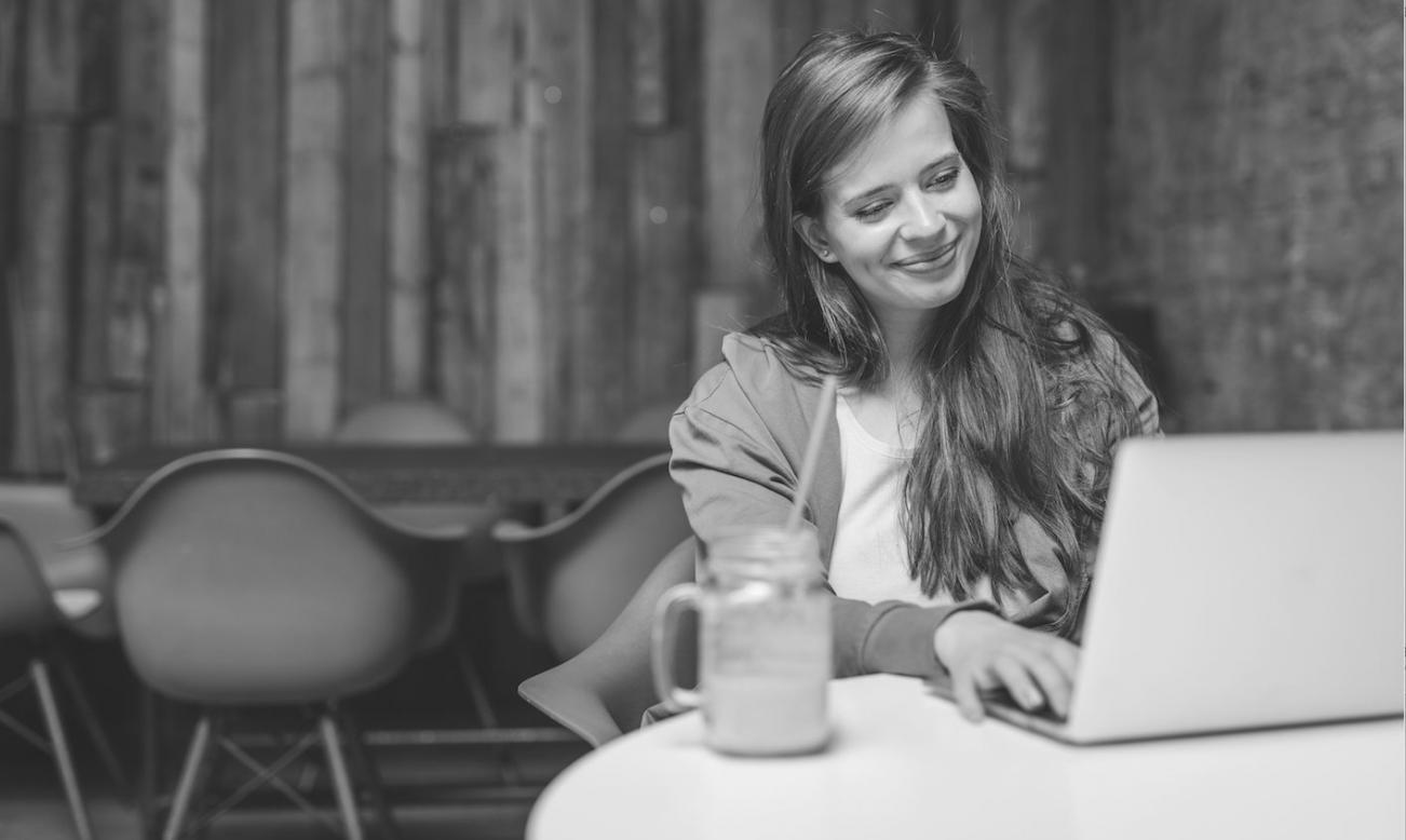 Modern educational workspace with financial planning resources and learning materials organized for student consultation